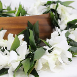 ti leaf maile lei with white orchids