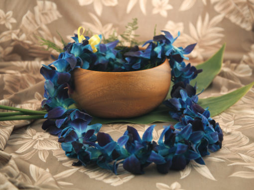 blue tinted orchid lei