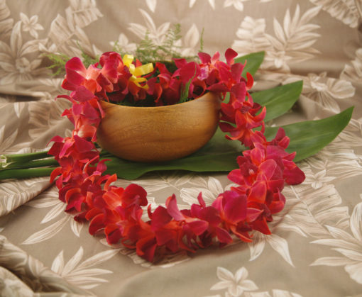 Red tinted orchid lei