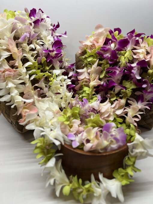 orchid leis in a variety of colors