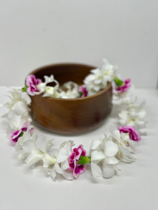 white orchid and pink carnation lei